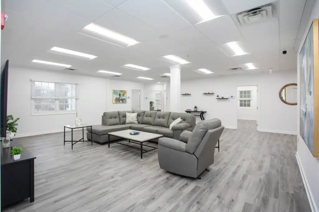 Lounge area with modern sofa at rolling hills recovery center