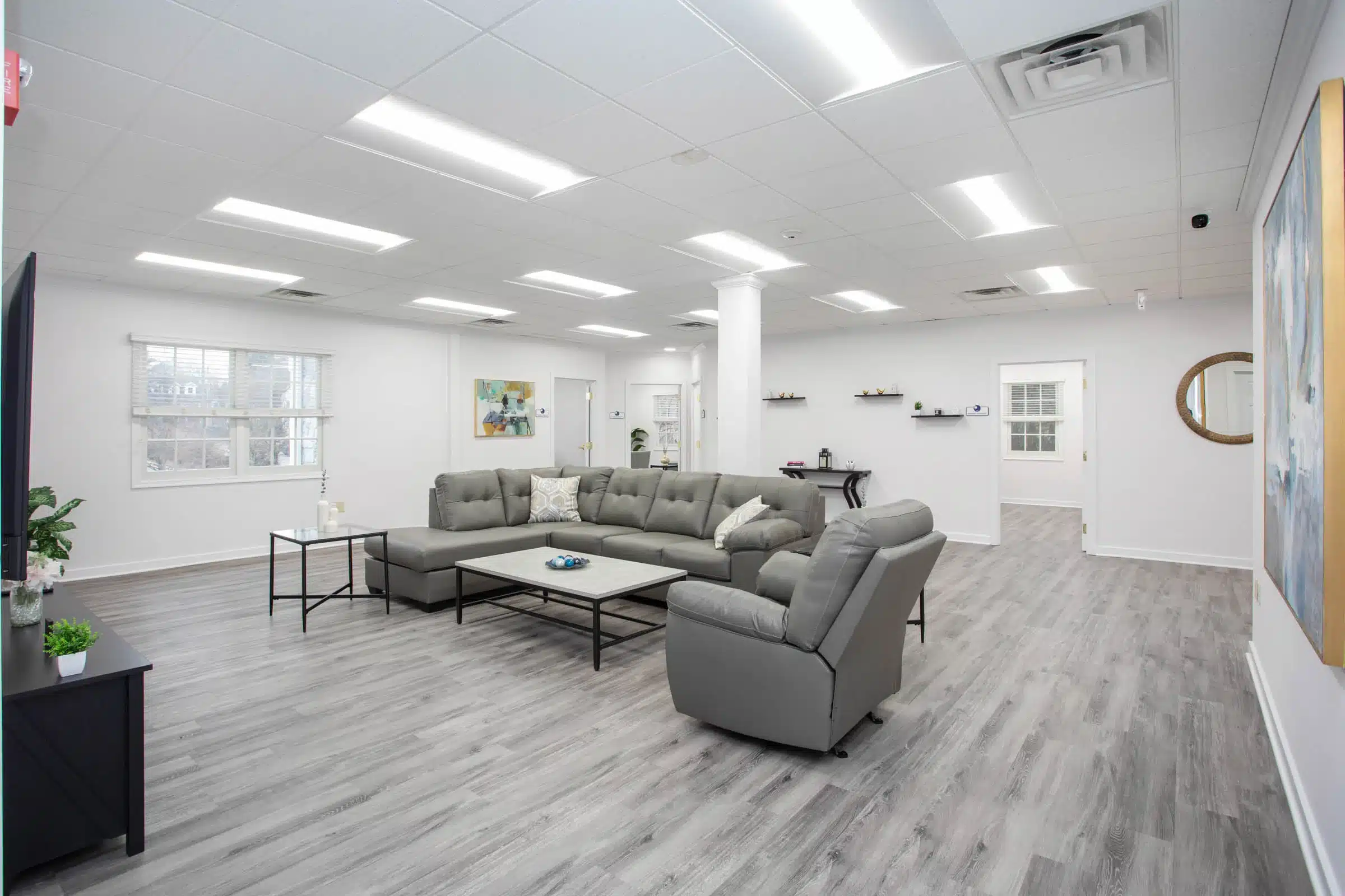 Lounge area with modern sofa at rolling hills recovery center