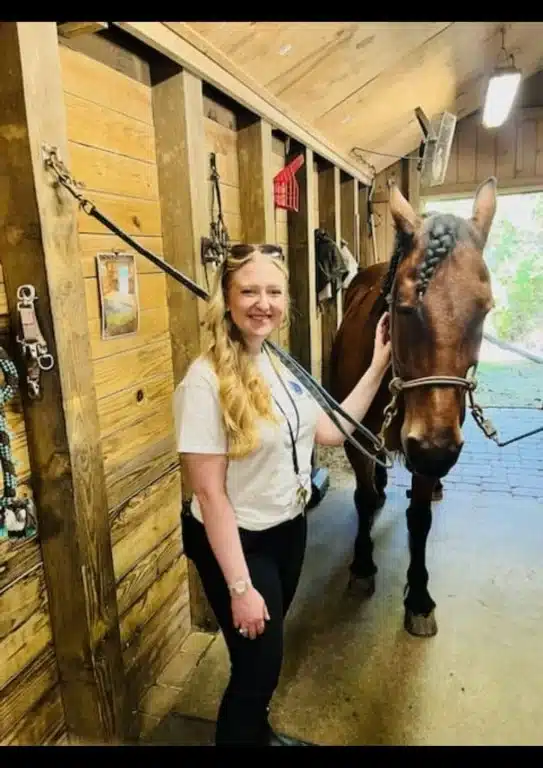 Therapist Brianna Bailey at the launch of Rolling Hills Recovery Center's equine therapy program.