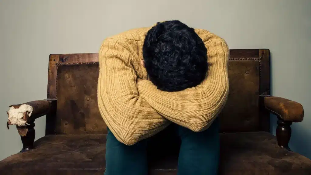 Person experiencing fatigue and emotional crash during meth withdrawal. Person experiencing fatigue and emotional crash during meth withdrawal.